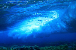 A wave breaking... taken from the underside... by Andrew Macleod 